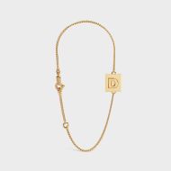 Celine Alphabet Bracelet with Letter D in Brass with Gold Finish Gold