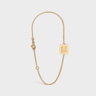 Celine Alphabet Bracelet with Letter E in Brass with Gold Finish Gold