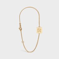 Celine Alphabet Bracelet with Letter R in Brass with Gold Finish Gold